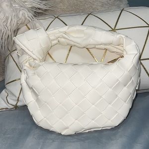 Mini Jodie woven handbag.